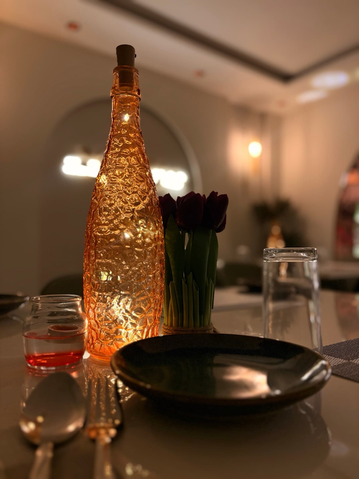 Dining table setup at Mangalam Hotel